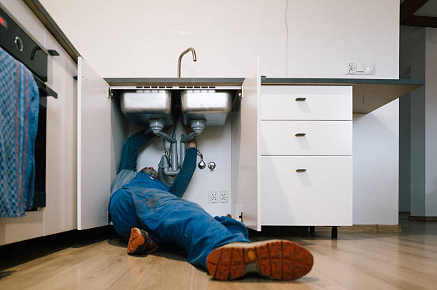 Professional Emergency Plumber technician working in Henderson, NC